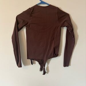 Skims seamless sculpt thong bodysuit in cocoa